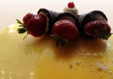 A semifreddo with fresh strawberries on top